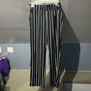 Black and white striped pants